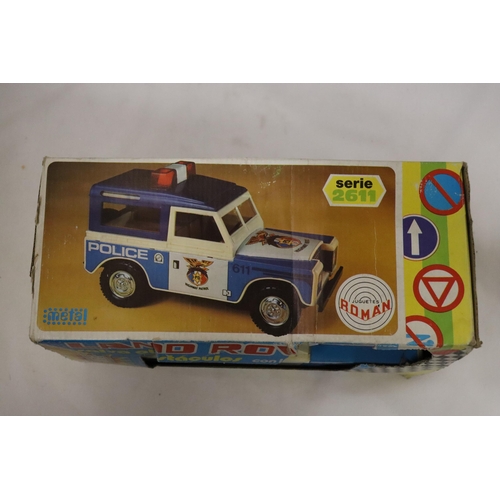 417 - A ROMAN TOYS, BOXED LANDROVER, SERIES 2611, POLICE JEEP