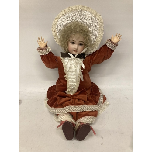 451 - A VINTAGE FRENCH BISQUE COLLECTOR'S DOLL IN FULL PERIOD DRESS WITH ARTICULATED LIMBS - 67 CM