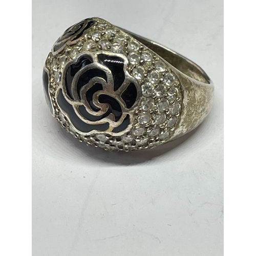 549 - A SILVER RING WITH CUBIC ZIRCONIAS IN A PRESENTATION BOX