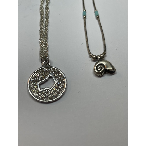 561 - FOUR SILVER NECKLACES WITH PENDANTS