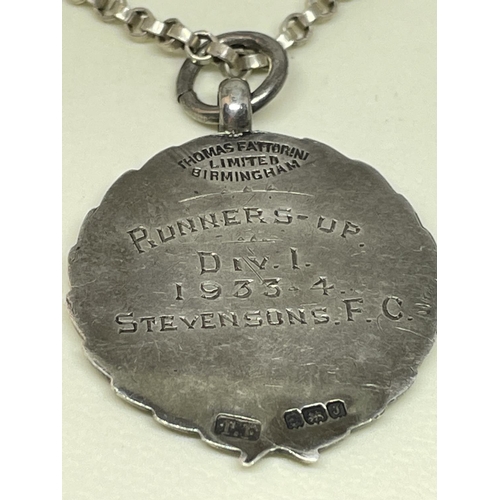 601 - A SILVER FOB NECKLACE IN A PRESENTATION BOX