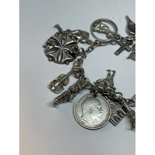 609 - A SILVER CHARM BRACELET