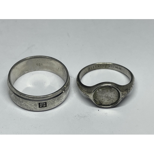 642 - FOUR VARIOUS SILVER RINGS