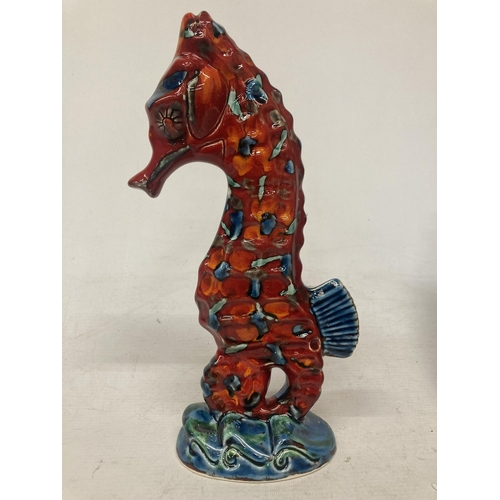 759 - AN ANITA HARRIS HAND PAINTED AND SIGNED IN GOLD SEA HORSE FIGURE