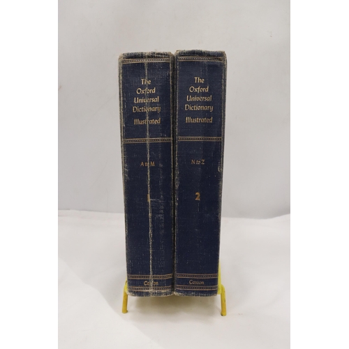 804 - A PAIR OF OXFORD UNIVERSAL DICTIONARY'S IN METAL STAND