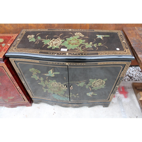 2513 - A 19TH CENTURY STYLE EBONISED TWO-DOOR SIDE CABINET WITH CHINOISERIE DECORATION, 32