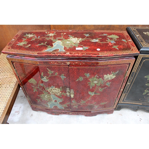 2514 - A 19TH CENTURY STYLE RED GROUND TWO-DOOR SIDE CABINET WITH CHINOISERIE DECORATION, 32