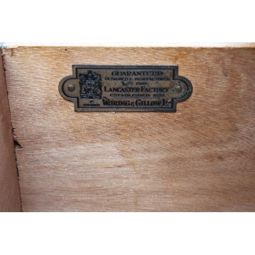 2520 - A MODERN MAHOGANY CHEST OF FIVE GRADUATED DRAWERS BEARING WARING AND GILLOW LABEL