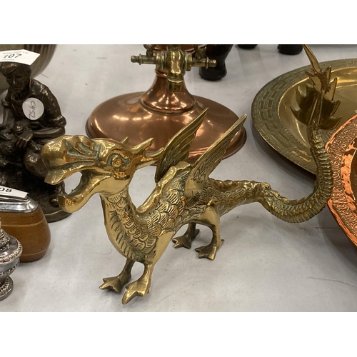 104 - A HEAVY BRASS MODEL OF A DRAGON, HEIGHT 15CM, LENGTH 25CM