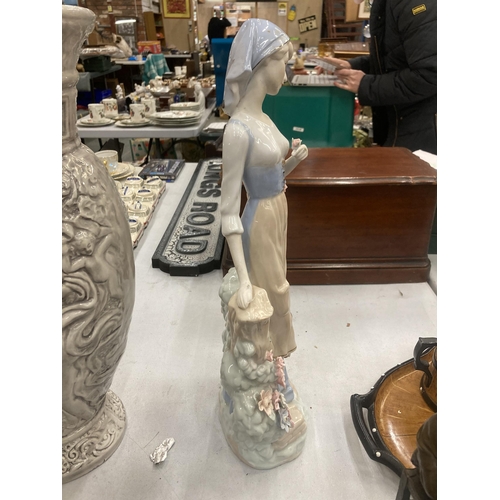 122 - A LARGE CERAMIC FIGURE OF A LADY, HEIGHT APPROX 45CM