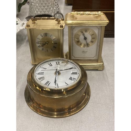 255 - THREE BRASS CLOCKS TO INCLUDE W. WIDDUP, STAIGER AND HERMLE