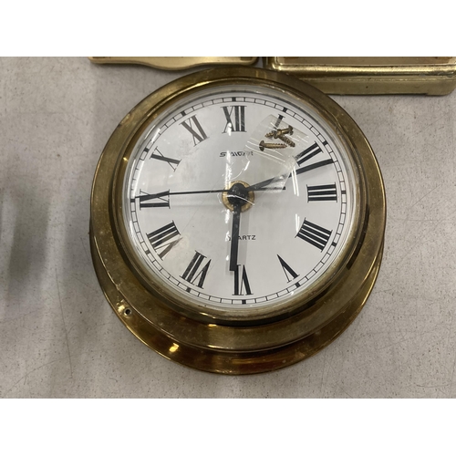 255 - THREE BRASS CLOCKS TO INCLUDE W. WIDDUP, STAIGER AND HERMLE