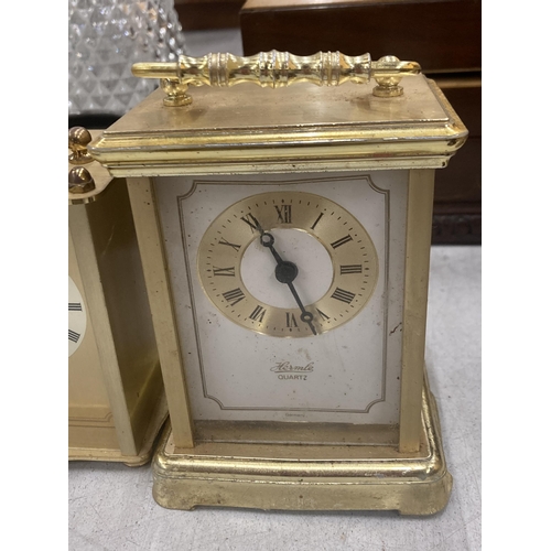 255 - THREE BRASS CLOCKS TO INCLUDE W. WIDDUP, STAIGER AND HERMLE