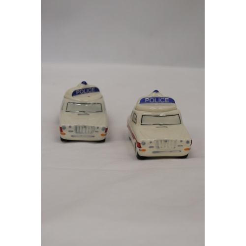 139 - THIRTEEN POLICE CAR EGG CUPS WITH SALT POT FOR LID