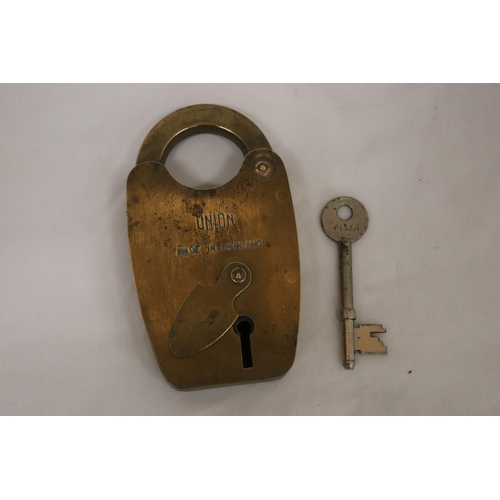 143 - A VINTAGE BRASS UNION PADDLOCK AND KEY - 5 INCH TALL