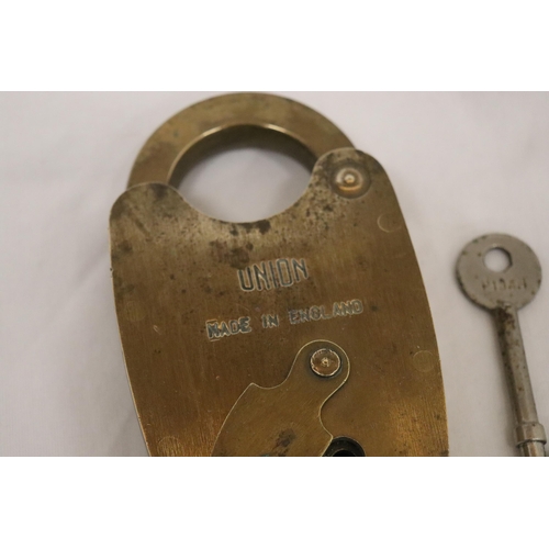 143 - A VINTAGE BRASS UNION PADDLOCK AND KEY - 5 INCH TALL