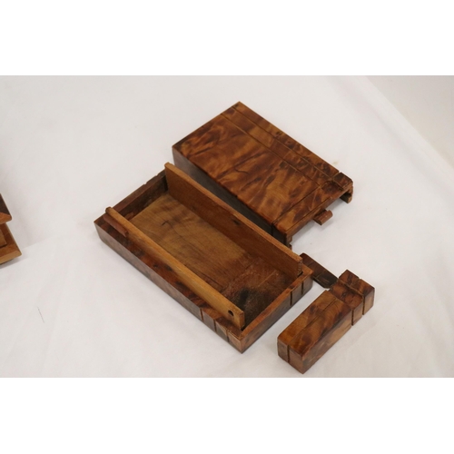 146 - A THUYA WOODEN BOX WITH FOUR COMPARTMENTS TOGETHER WITH A WOODEN DESK TIDY AND PUZZLE BOX