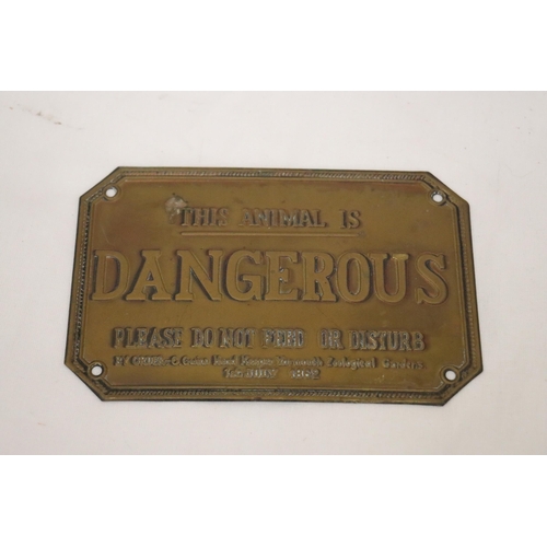 151 - A VINTAGE BRASS PLATE 