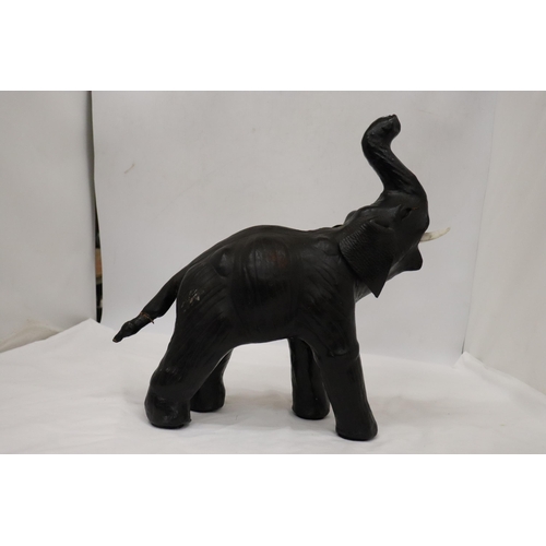 153 - A LARGE LEATHER ELEPHANT