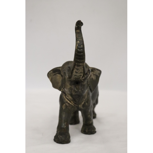 161 - A HEAVY METAL FIGURE OF AN ELEPHANT