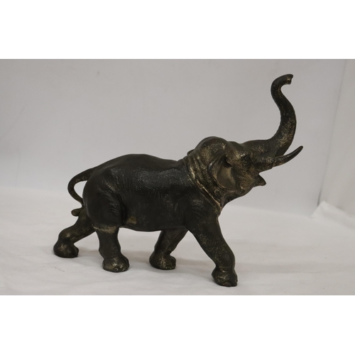 161 - A HEAVY METAL FIGURE OF AN ELEPHANT