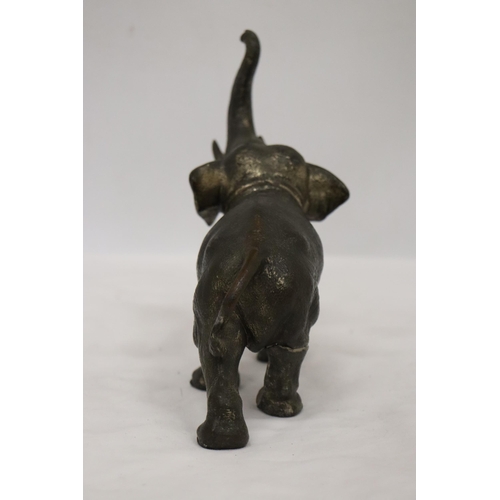 161 - A HEAVY METAL FIGURE OF AN ELEPHANT