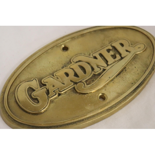 163 - AN OVAL BRASS GARDNER SIGN