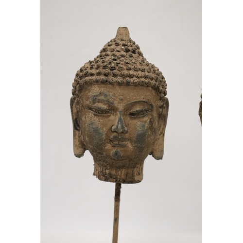 167 - TWO BUDDAH HEADS ON STANDS