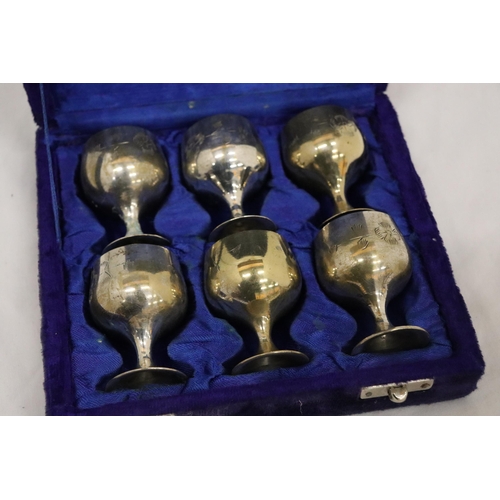 168 - A SET OF SIX SMALL SILVER PLATED GOBLETS IN A PRESENTATION CASE