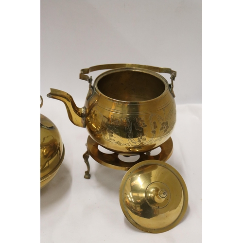 170 - TWO BRASS KETTLES, A CLOISONNE KETTLE AND A TRIVET