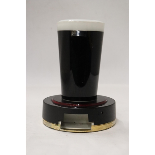 185 - A RARE GUINNESS, LIGHT UP COUNTER SIGN, IN THE FORM OF A PINT GLASS, HEIGHT 18CM