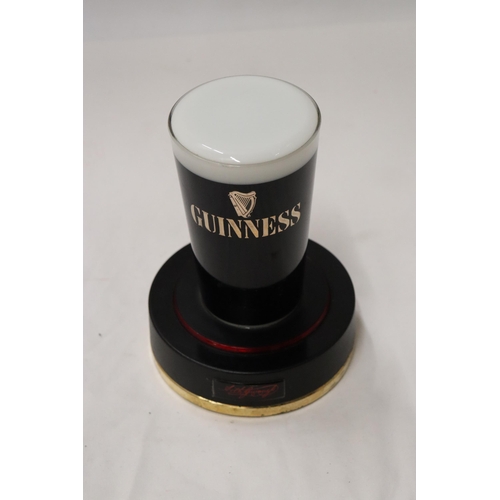 185 - A RARE GUINNESS, LIGHT UP COUNTER SIGN, IN THE FORM OF A PINT GLASS, HEIGHT 18CM