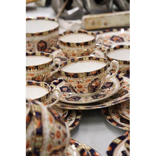 186 - AN ANTIQUE 'COURT CHINA' TEASET TO INCLUDE CAKE PLATES, CUPS, SAUCERS, SIDE PLATES AND A SUGAR BOWL