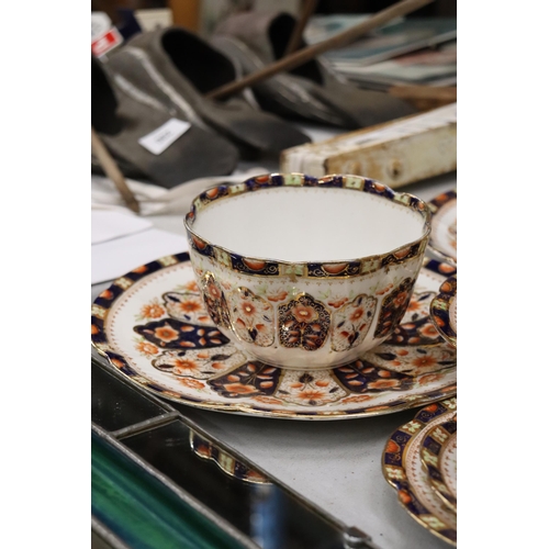 186 - AN ANTIQUE 'COURT CHINA' TEASET TO INCLUDE CAKE PLATES, CUPS, SAUCERS, SIDE PLATES AND A SUGAR BOWL