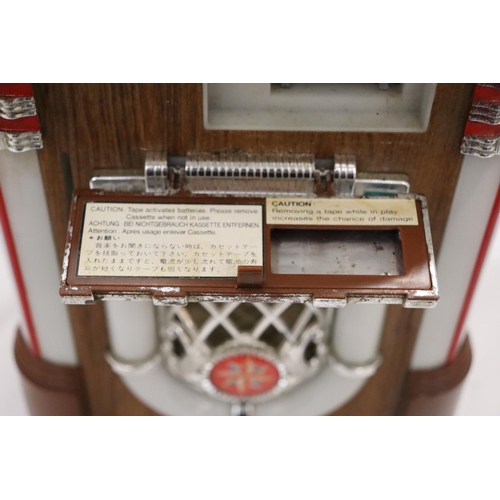 201 - A MINI WURLITZER MICRO CASSETTE PLAYER