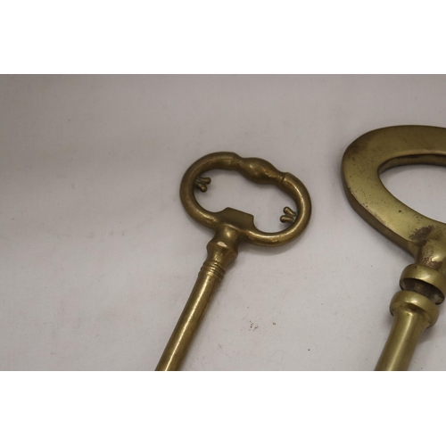 209 - TWO LARGE HEAVY WEIGHT VINTAGE BRASS KEYS - ONE 13 INCHES LONG