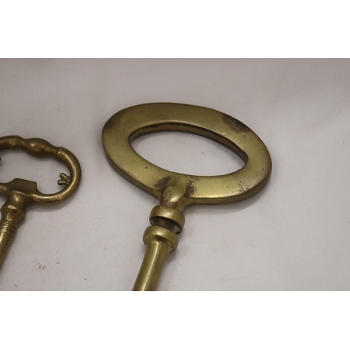 209 - TWO LARGE HEAVY WEIGHT VINTAGE BRASS KEYS - ONE 13 INCHES LONG