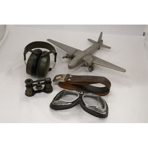 214 - FIVE VINTAGE WAR ITEMS TO INCLUDE PILOT GOGGLES, HEADPHONES, PLANE, BELT AND BINOCULARS