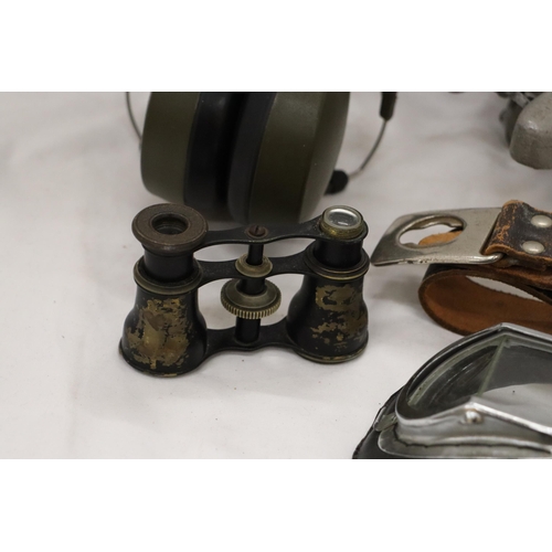 214 - FIVE VINTAGE WAR ITEMS TO INCLUDE PILOT GOGGLES, HEADPHONES, PLANE, BELT AND BINOCULARS