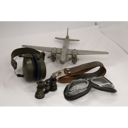 214 - FIVE VINTAGE WAR ITEMS TO INCLUDE PILOT GOGGLES, HEADPHONES, PLANE, BELT AND BINOCULARS