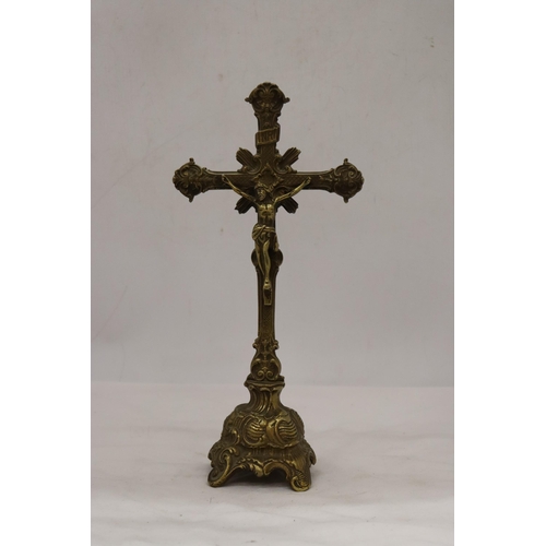 215 - A LARGE HEAVY BRASS CROSS