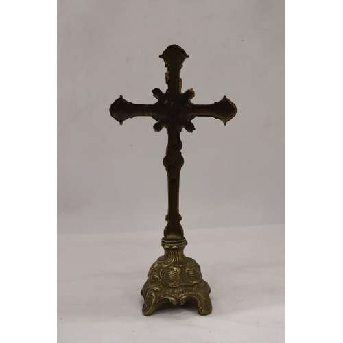 215 - A LARGE HEAVY BRASS CROSS