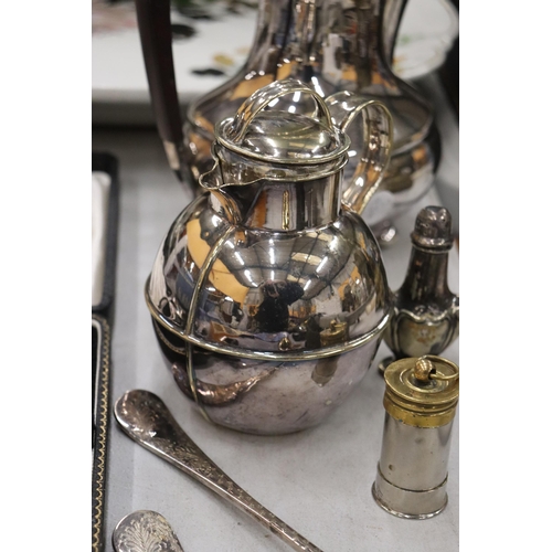 217 - A QUANTITY OF SILVERPLATE TO INCLUDE A COFFEE POT, COFFEE WAMER, SPOONS ETC