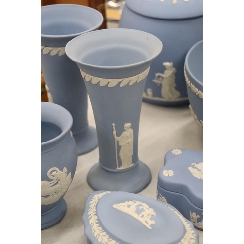 219 - A COLLECTION OF JASPERWARE BLUE AND WHITE WEDGWOOD TO INCLUDE A BISCUIT BARREL, VASES, TINKET BOXES,... 