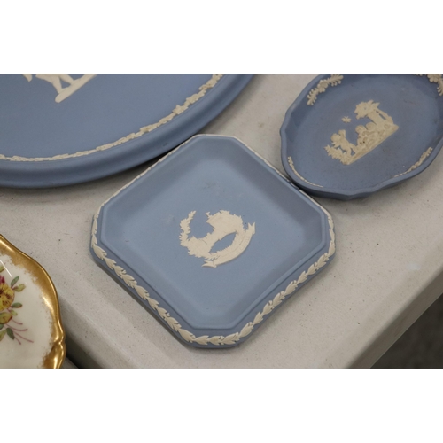 219 - A COLLECTION OF JASPERWARE BLUE AND WHITE WEDGWOOD TO INCLUDE A BISCUIT BARREL, VASES, TINKET BOXES,... 