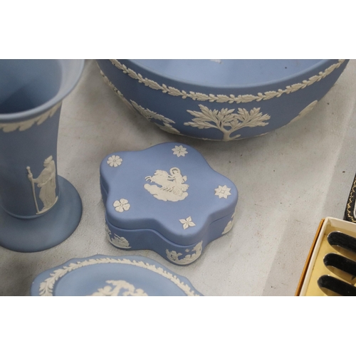 219 - A COLLECTION OF JASPERWARE BLUE AND WHITE WEDGWOOD TO INCLUDE A BISCUIT BARREL, VASES, TINKET BOXES,... 