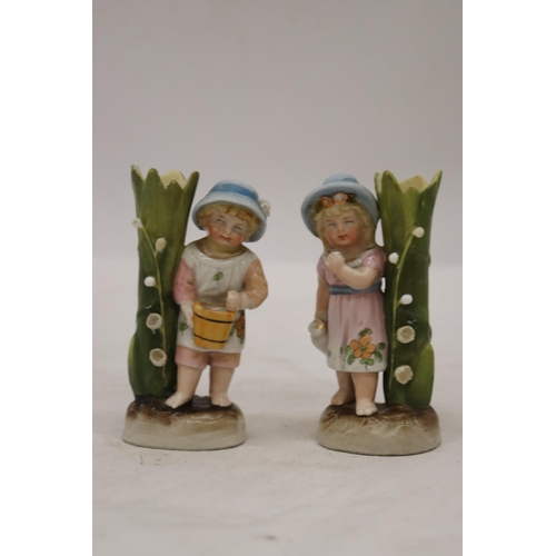 229 - TWO VINTAGE GERMAN CONTA AND BOHME FAIRINGS TO INCLUDE A GIRL WITH JUG VASE AND A GIRL WITH BASKET V... 