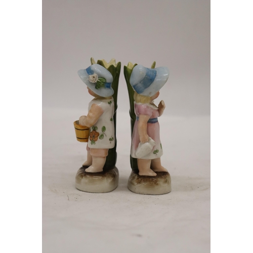 229 - TWO VINTAGE GERMAN CONTA AND BOHME FAIRINGS TO INCLUDE A GIRL WITH JUG VASE AND A GIRL WITH BASKET V... 