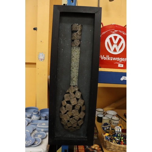 293 - A METAL IMAGE OF A VASE IN A METAL FRAME, 30CM X 91CM