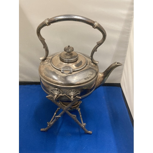 11 - A SILVER PLATED SPIRIT KETTLE WITH FRAME AND BURNER